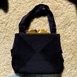 Vintage Dark Navy Handbag with gold tone clasp.